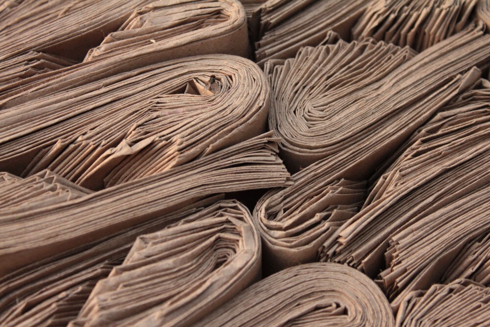 Newspapers pile